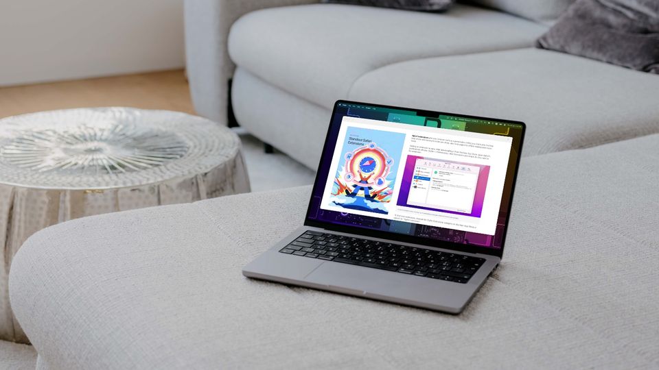 MacBook Pro 14-inch placed on a Sofa showing Safari Extensions