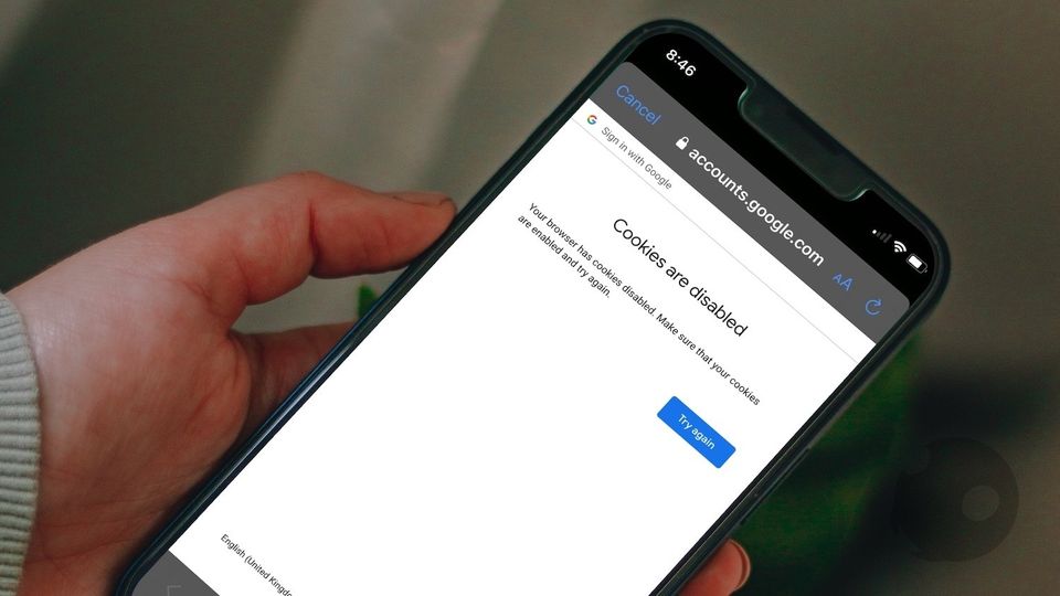 iPhone in hand showing cookies are disabled error
