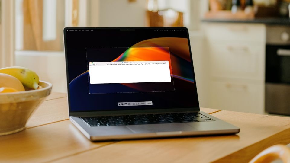 MacBook Pro on wooden table