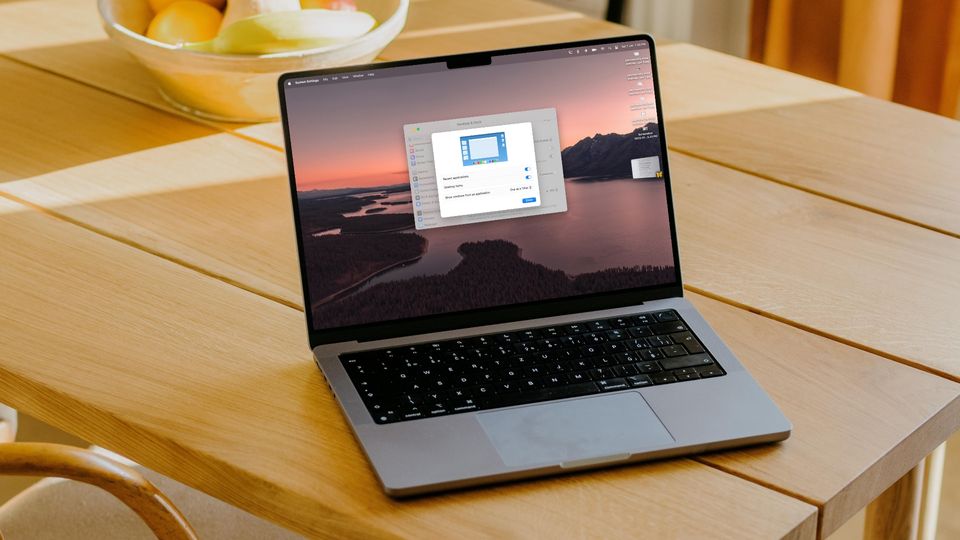 MacBook Pro on Wooden Table Showing Stage Manager