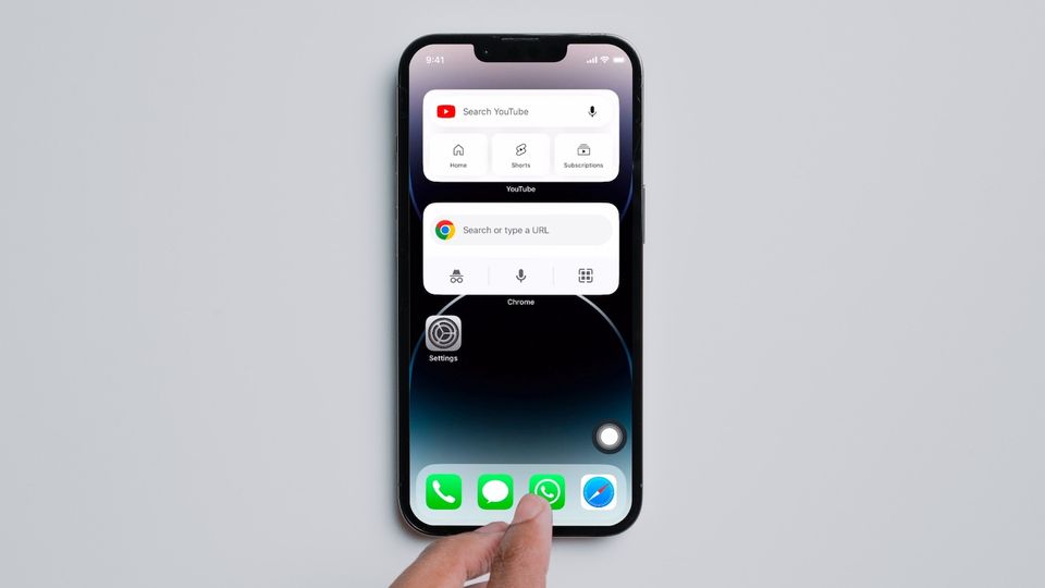 iPhone 13 showing home button on screen