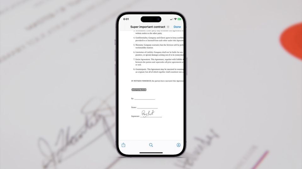 Sign a PDF on iPhone featured image showing iPhone with a signed PDF