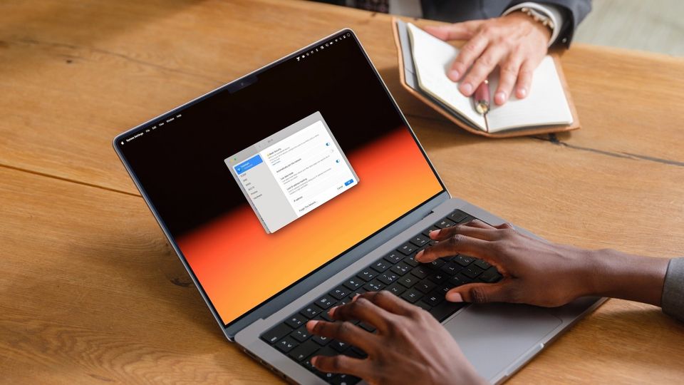 MacBook pro on Wooden table showing Forget Wi-Fi network button