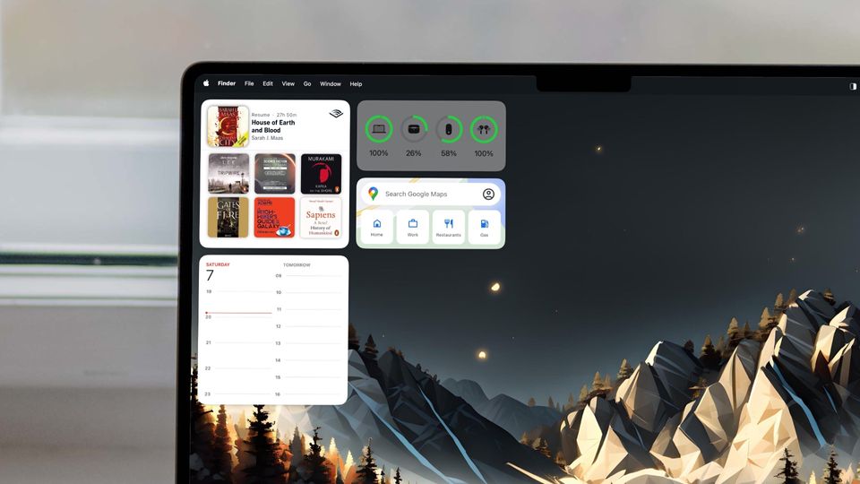 MacBook Pro screen showing full-colored widgets